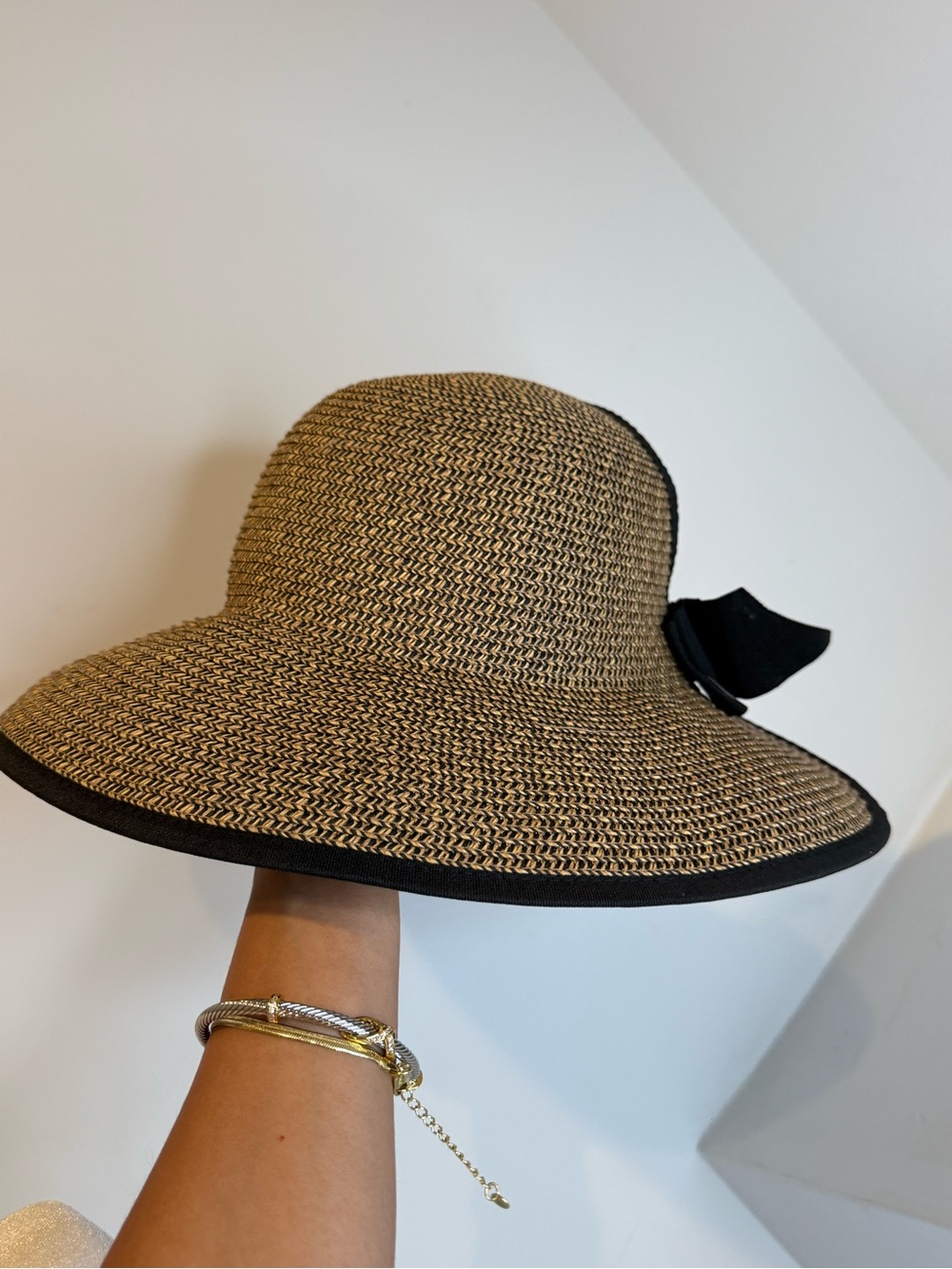 Scala Beige Woven Sun Hat with Black Trim and Bow Accent. Wide Brim Sun Hat